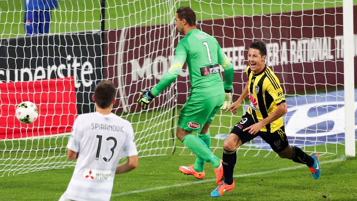 HE'S IN: Blayney's Nathan Burns celebrates scoring one of his 13 goals for the Wellington Phoenix during the 2014-15 A-League season. Photo: GETTY IMAGES