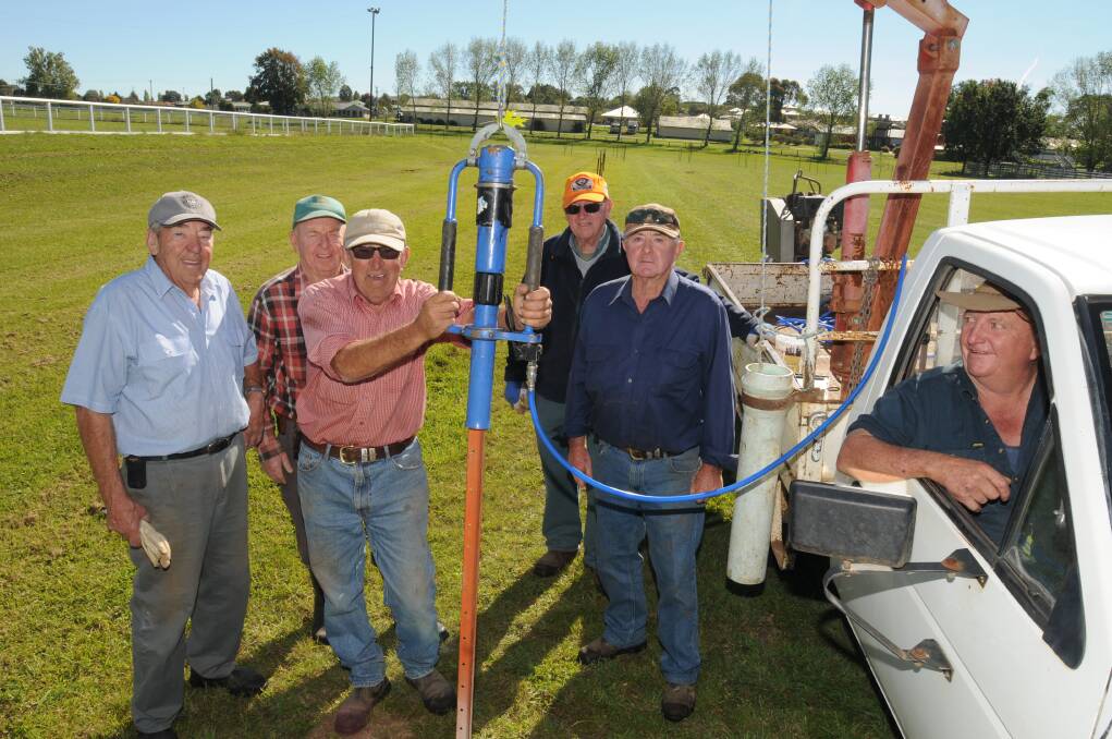 GROUNDSWELL OF SUPPORT: Volunteers Terry Duff, Ken Mathews, Boss Duff, Jim Doak, Bob Fenton and Gilbert McFawn spent Monday driving stakes into the earth, getting the showground ready for this year’s Orange Show. Photo: STEVE GOSCH 0421sgshow1
