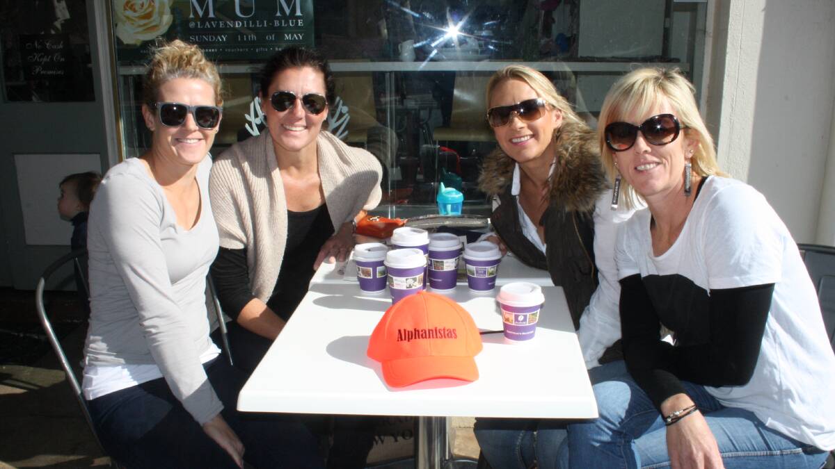 THEY DID IT: Kate Staniforth (left), Rene Logan, Alison Payne and Leighanne Ward earnt yesterday's coffee. Photo: MICHELLE COOK 0508mcwalkers
