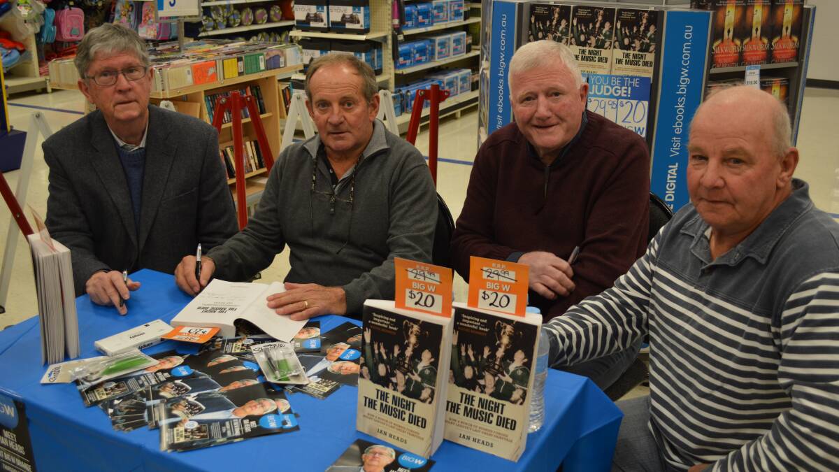 LOCAL HEROES: Author Ian Heads with 1974 Western Division Amco Cup winners Dave Kent, Greg Fearnley and Bob Pilon at yesterday's book signing. Photo: MATT FINDLAY 0807mfsigning