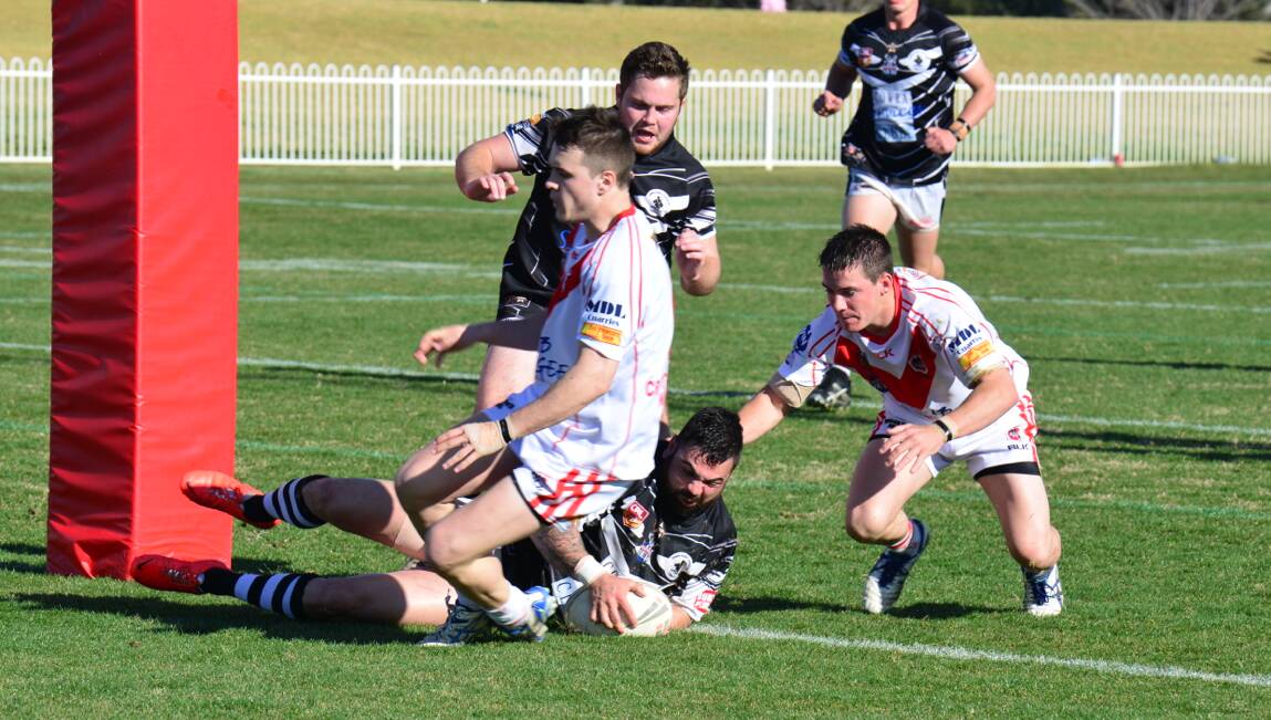 TRY TIME: Ben Gunn scores for Cowra in their Group 10 premier league qualifying semi-final win over Mudgee. Photo: COL BOYD