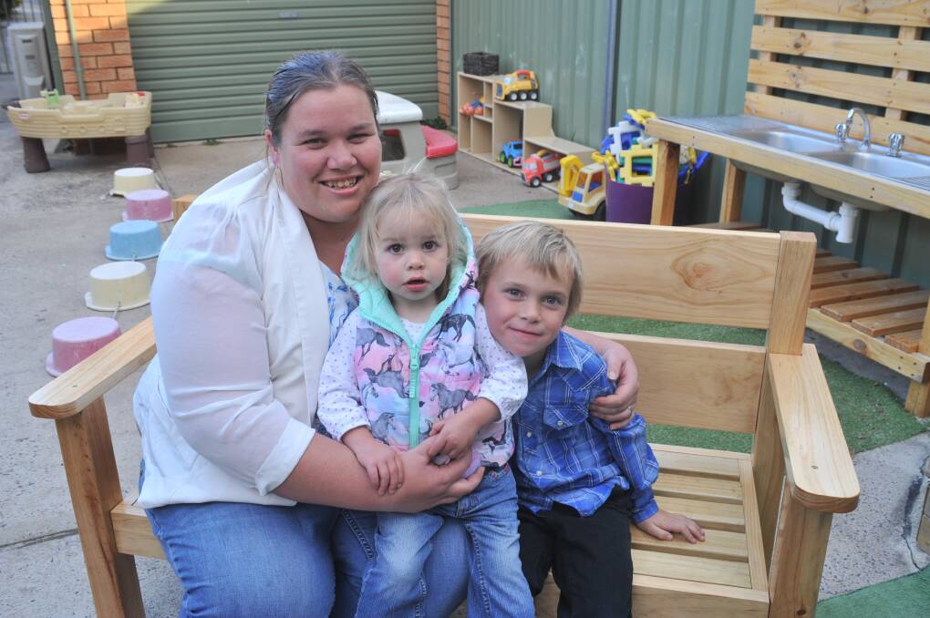 REGION'S BEST: Orange Family Day Care educator Kellie Tom with her daughter Maci and son Riley has been nominated for a national award. Photo: JUDE KEOGH 0829jkcare2