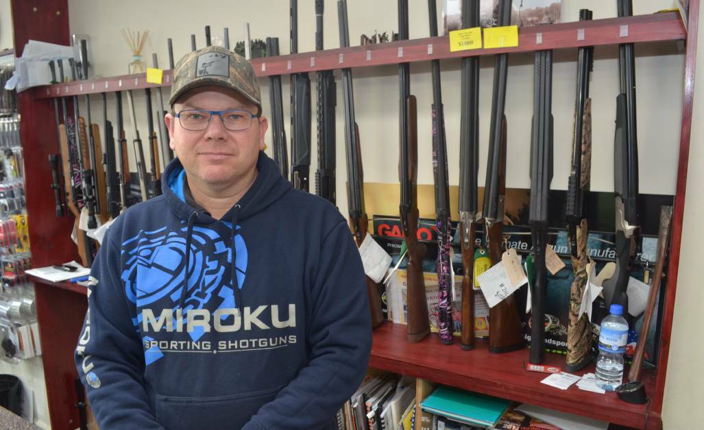 Bullets and Bits owner Ray Hawkins said sporting shooters often used a variety of guns in different disciplines. Photo: DECLAN RURENGA 0715drhawkins1