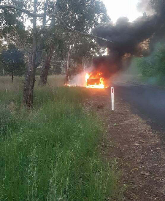 ALIGHT: A Mitsubishi Triton stolen from North Orange was torched behind the hospital on Wednesday morning. Photo: CONTRIBUTED