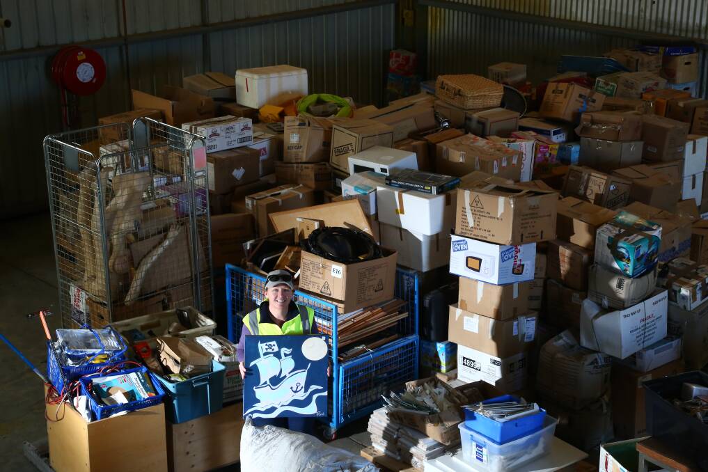 GARAGE SALE: Vinnies warehouse supervisor Melissa Stewart said the sale on July 8 would have around two to three stores worth of stock. Photo: PHIL BLATCH 0626pbvinnies1