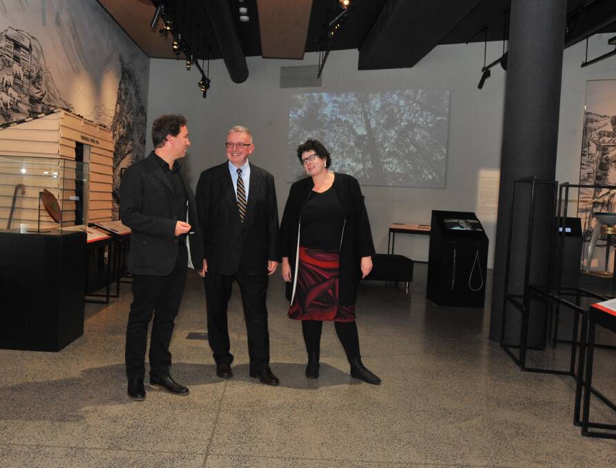 GRAND TOUR: Museum director Brad Hammond, arts minister Don Harwin and Arts Out West executive director Tracey Callinan tour Orange Regional Musuem.