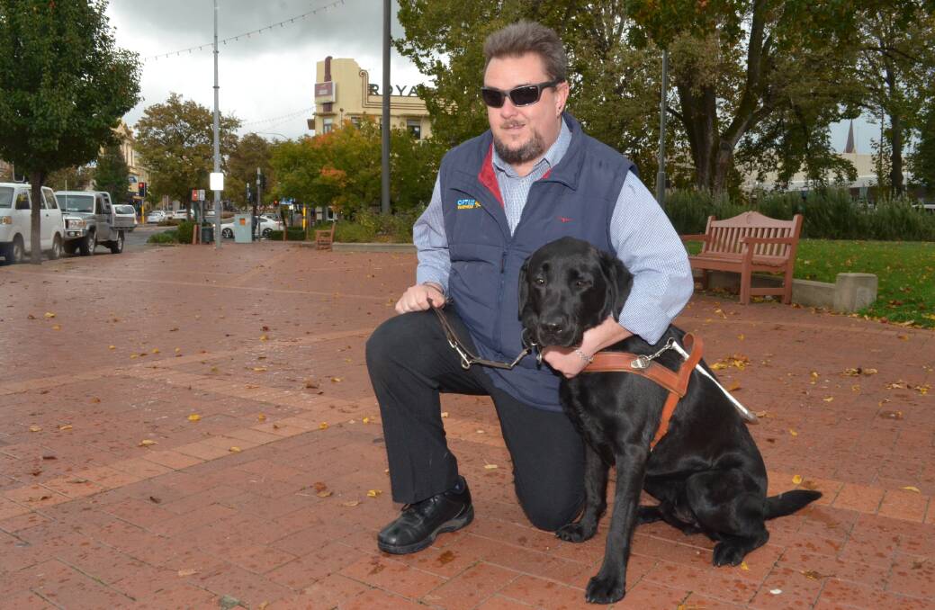 TAKING THE LEAD: Orange's Matt Bryant is reminding accommodation operators that guide dogs can go anywhere a member of the public can. Photo: DECLAN RURENGA