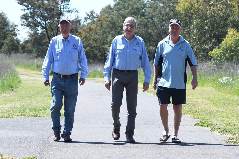 WALKING THE WALK: Canobolas Lions Club president Norm Bembrick with members Bob Fabry and Neil Cameron are walking to fund new prostate cancer equipment. Photo: JUDE KEOGH 1115jklions1