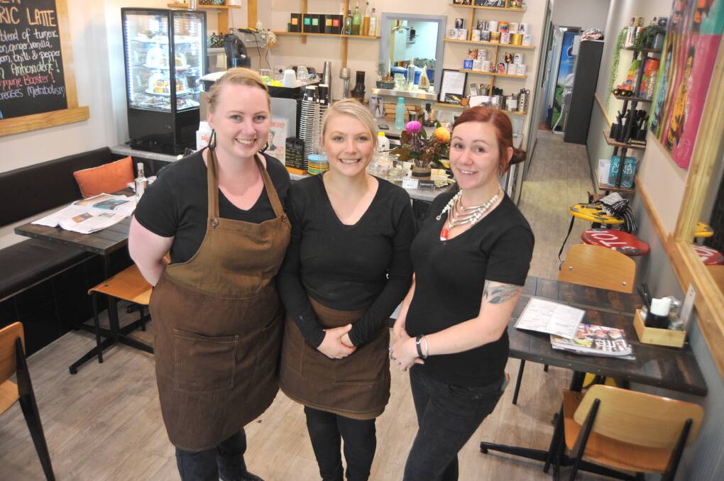 While some retailers and restaurants may open, Bensons Cafe's Taylor Zarnow, Claudia Billiau and Sarah Wells won't be serving up hot coffee and tasty treats on Boxing Day. Photo: JUDE KEOGH 1101jkboxing3