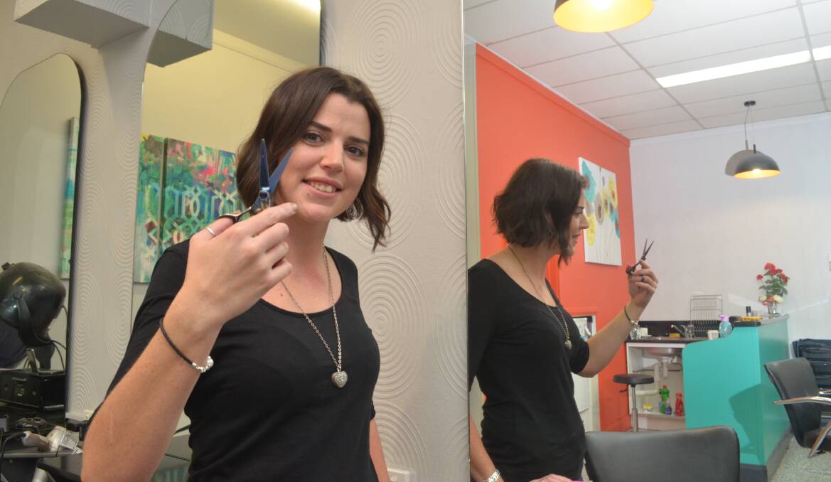 ONLY HAIR CUTS: Hairdresser Jess Lamrock said there should be no cuts to penatly rates which were small compensation for workers with families. Photo: DECLAN RURENGA