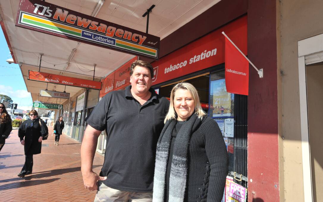 NEW FACES: TJ's Downtown Newsagency owners Justin and Danielle Clark. Photo: JUDE KEOGH
