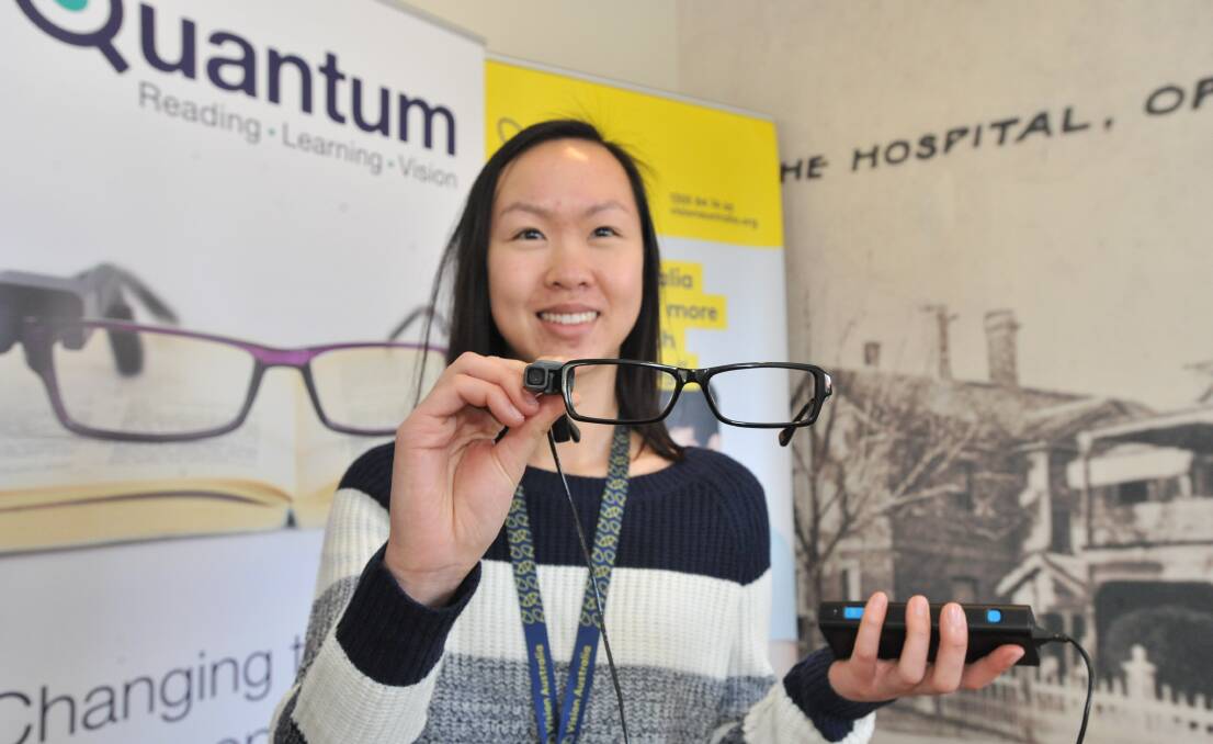 ARM MOUNTED: Vision Australia's access technologist Vivian Chan shows off the OrCam MyEye device. Photo: JUDE KEOGH 