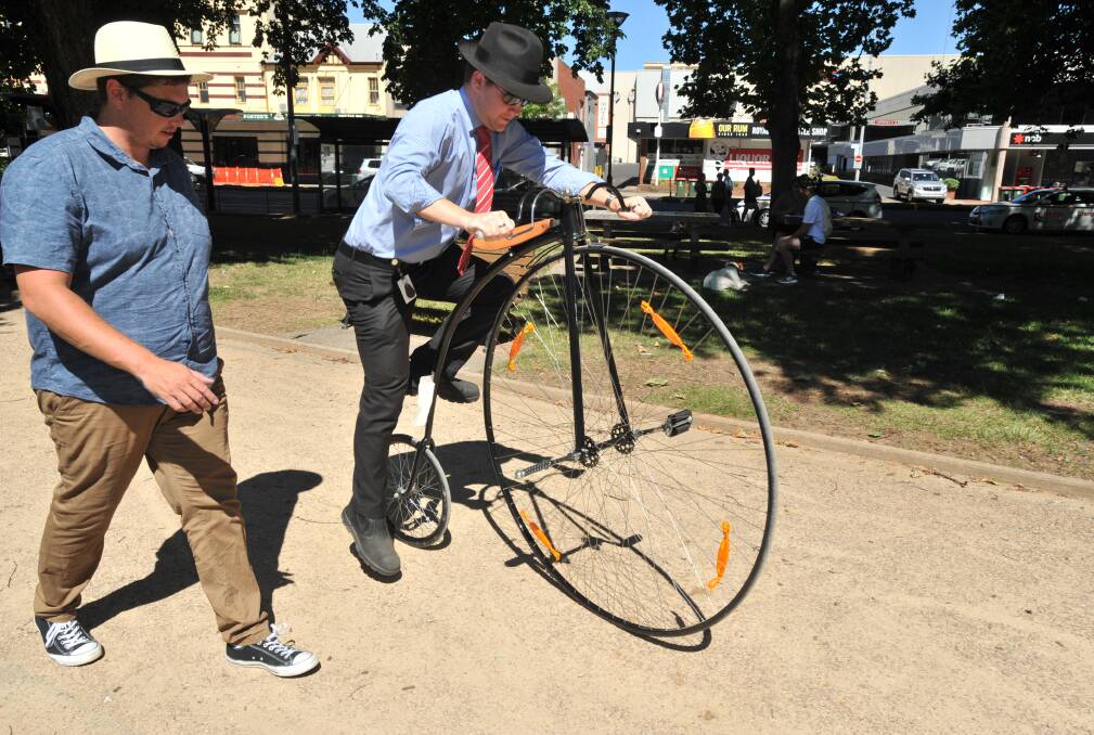 TOUGH ASK: It turns out getting onto a Penny-farthing is much easier than it looks. Photo: JUDE KEOGH