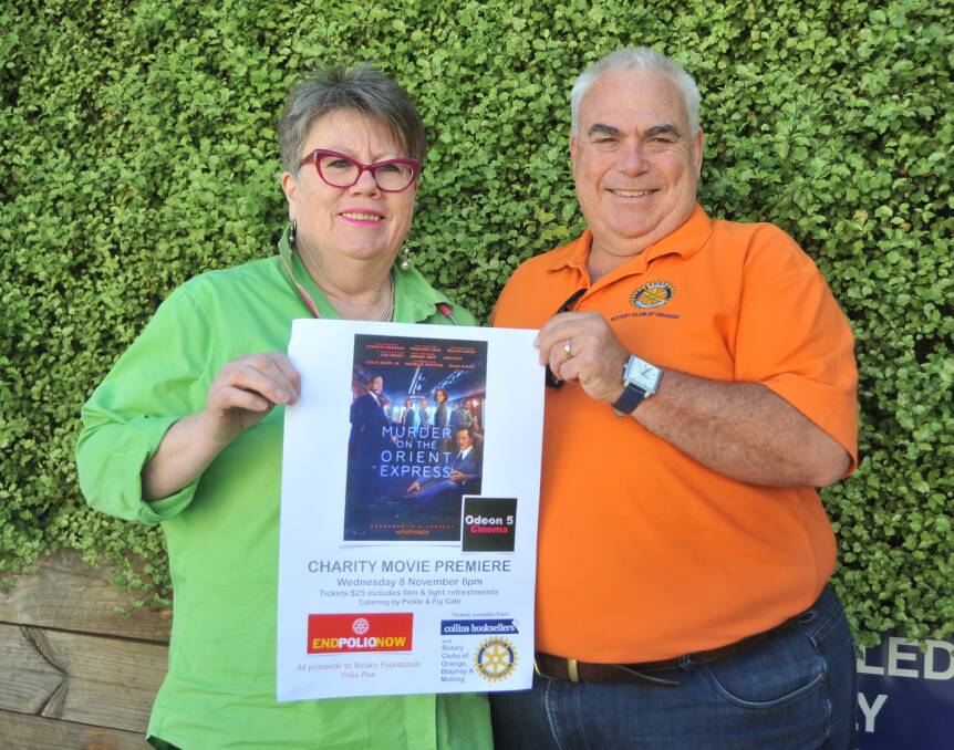 MORE THAN RAFFLES: Rotarians Lynne Lambell and Scott Kable organised a movie night to raise funds to help end polio worldwide. Photo: JUDE KEOGH 