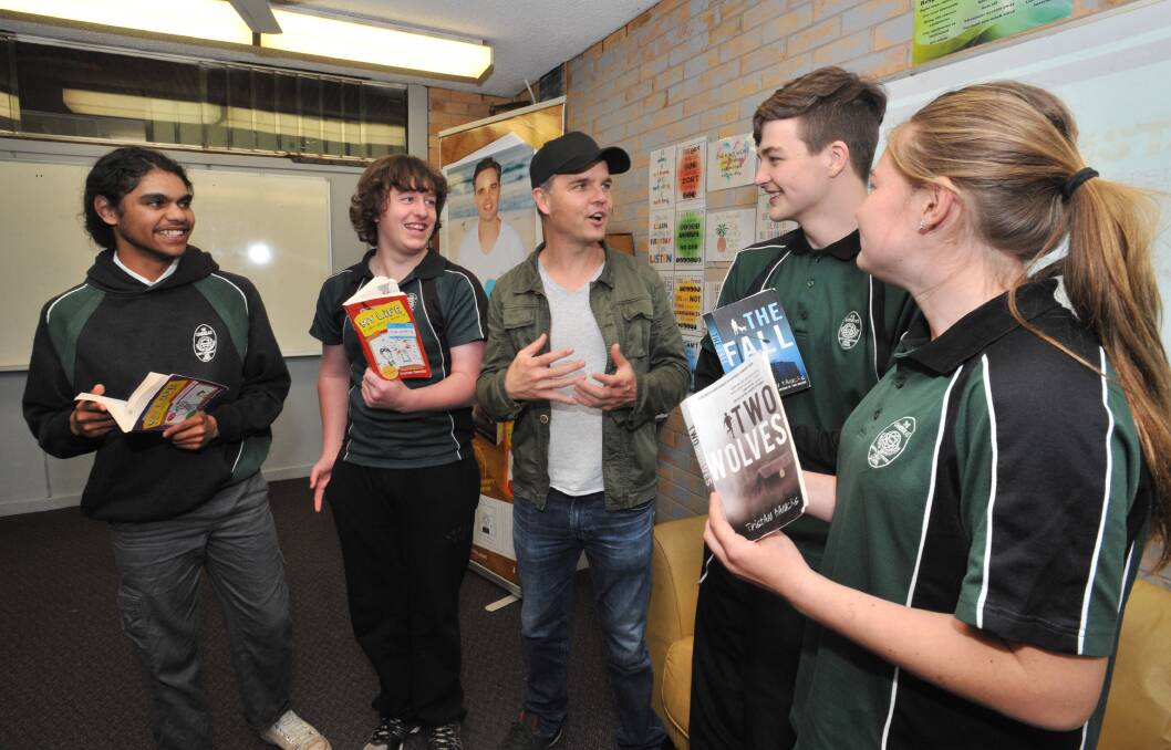 BROUGHT TO LIFE: Author Tristan Bancks speaking to Canobolas Rural Technology High students Deejay Parsons, Justin Alexander, Cooper O'Neil and Hannah Ivanoff. Photo: JUDE KEOGH 0627jkbooks1