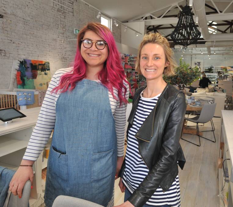 BOUTIQUE: Jumbled manager Jess Conliffe with owner Pip Brett in the newly opened Sonic. Photo: JUDE KEOGH 0912jksonic1