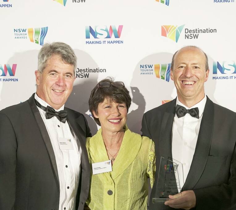 BRONZE: Council's Glenn Mickle with Pam and Trevor King from Lakeview Luxury Cabins. Photo: KYLE MANNING