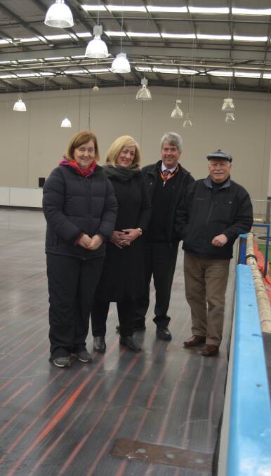 Testing out the ice at new skating rink is Winter Wonderland owner Lorraine, Orange Homemakers Centre manager Janelle Matus, council's tourism manager Glenn Mickle and deputy mayor Chris Gryllis. Photo: DECLAN RURENGA