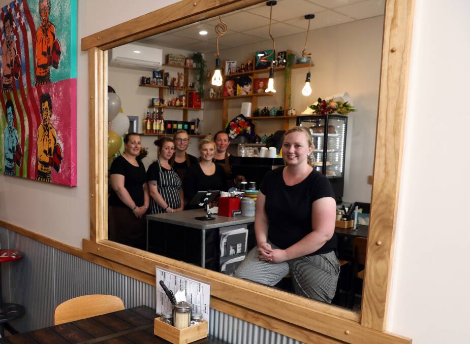 ALL SMILES: Bensons Cafe's Emily Boaden, Sarah Wells, Samantha Cridland, Claudia Billiau, Esther Parton and owner Taylor Zarnow on Wednesday. Photo: ANDREW MURRAY