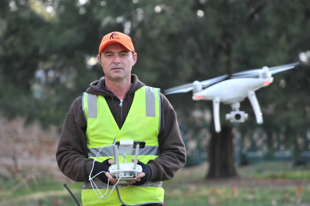 Drone operator Troy Pearson said piloting the devices wasn't just about pulling them out of the box. Photo: JUDE KEOGH 0530jkdrone5