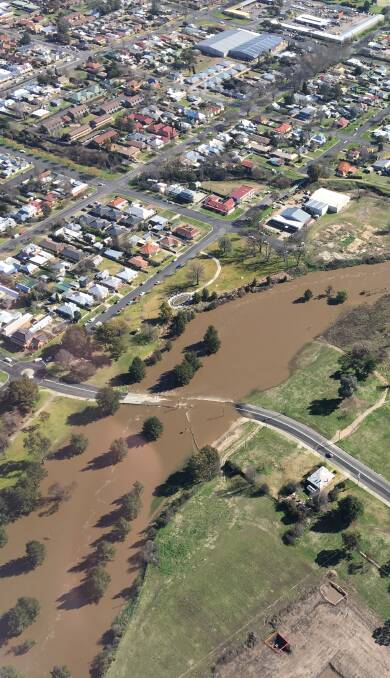 FLOODED: The Gordon Edgell Bridge in Bathurst was cut by floodwaters on Wednesday evening. It remains closed to traffic. Photo: DAVID CARROLL 072116aerial12