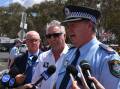 OPERATION: Assistant Commissioner Geoff McKechnie (on right) with Bathurst mayor Graeme Hanger and Supercars CEO Shane Howard. Photo: NADINE MORTON 100517nmpolice2