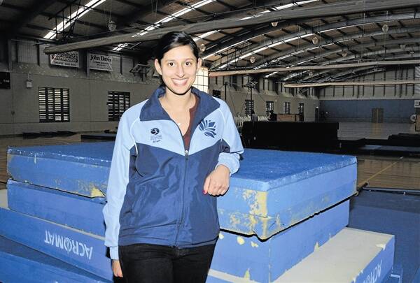 STAR WATCH: Commonwealth Games gold medallist Naazmi Johnston is excited about the Gymnastics NSW Country Championships being in Orange. Photo: JUDE KEOGH 0711gym2