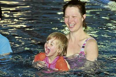 TESTING THE WATER: Leanne and Olivia Burns at yesterday's learn to swim class.