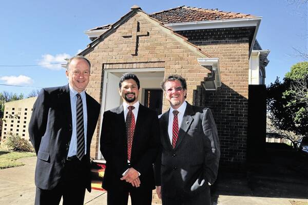 PLACE OF WORSHIP: Catherine McAuley Primary School principal Michael Croke with Centacare Bathurst director Robert George and parish priest Fr Paul Devitt at the official opening of the chapel. Photo: JUDE KEOGH  0613chapel6