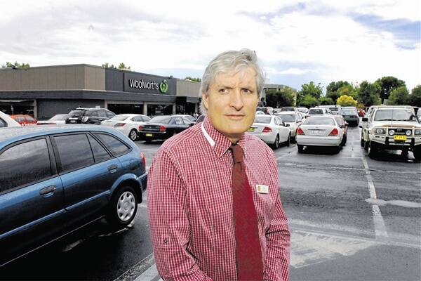 Nick Hansen from Hansen Optometrists has noticed little improvement to car parking spaces at the Anson Street since the north Orange Woolworths was open. Photo: STEVE GOSCH. 0217sgcarpark1