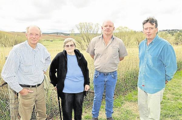 BLOWN AWAY: Ron and Marie Burton, John Foster and Winston Jones are some of the residents who object to a wind farm being built near Flyers Creek.  Photo: JUDE KEOGH
