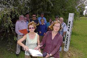 OUR PARK: Rose Middleton and Vicki George are fighting to save Fred Dobbin Park, along with Kevin and Bonnie Bale, Bruce Kelly, Damian Duffy, Bernie and Barbara Davis, Glenda Darley, Margaret Maker, Col Darley and Michael Maker.