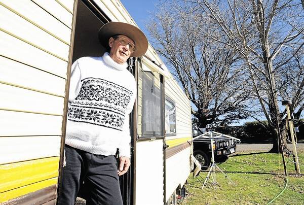 BECAUSE THEY VAN: Colour City Caravan Park resident Ken Murchie has been slugged with a 56 per cent increase in his site fees. Photo: JUDE KEOGH. 0706vanrent