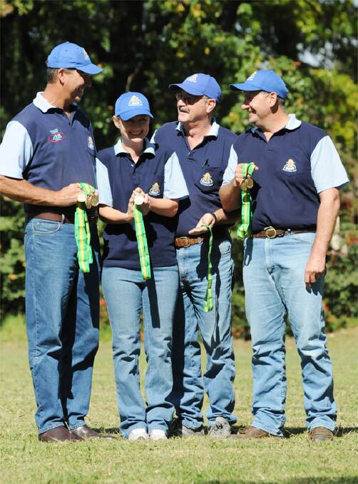 TOP GUNS: Orange and District Pistol Club’s Dean Brus (left), Lara Cowling, Max Wicks and Dave Oates were dominant at the national championships. Photo: JUDE KEOGH      0415pistol2