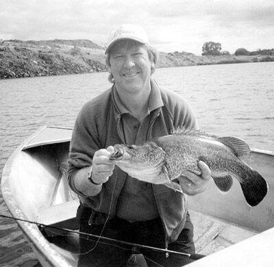 The late Joe Priest with one of his prize catches of a Murray Cod caught with his own lure in the New England area.