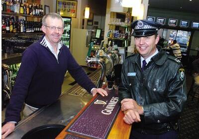 NEW LAWS: Licensee of the Canobolas Hotel Phil Tudor with licensing officer Senior Constable Mick Wheelhouse.