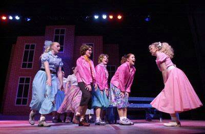‘SUMMER NIGHTS’: Sandy tells Jan, Frenchie, Marty and Pattie all about her summer lovin’ in the Orange Theatre Company’s production of Grease, which opens tomorrow night at the Orange Civic Theatre. PHOTO: STEVE GOSCH