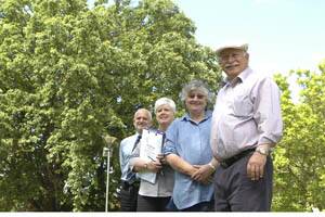 CHRISTMAS SPIRIT: Orange City Council community barbecue organisers Michael Milston, Jennifer Derrick, Elizabeth Griffin and Chris Gryllis have planned a “great family night” tonight that includes the inaugural lighting of the Christmas tree in Robertson Park.