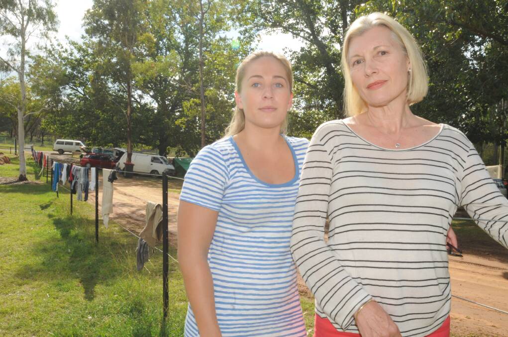 DIFFERENT CAMPS: Georgina Andrews and Mandy Crawley believe a primitive camping area set-up at Lake Canobolas is being misued by campers. Photo: LUKE SCHYULER. 0308lslakelitter