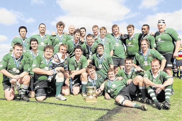 WE ARE THE CHAMPIONS: Orange Emus players celebrate their third grade Blowes Menswear Cup premiership on Saturday.