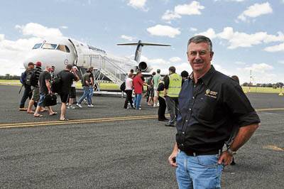 TAKE OFF: Newcrest Mining Limited asset management general manager Tony McPaul with the charter plane bound for Western Australia.
