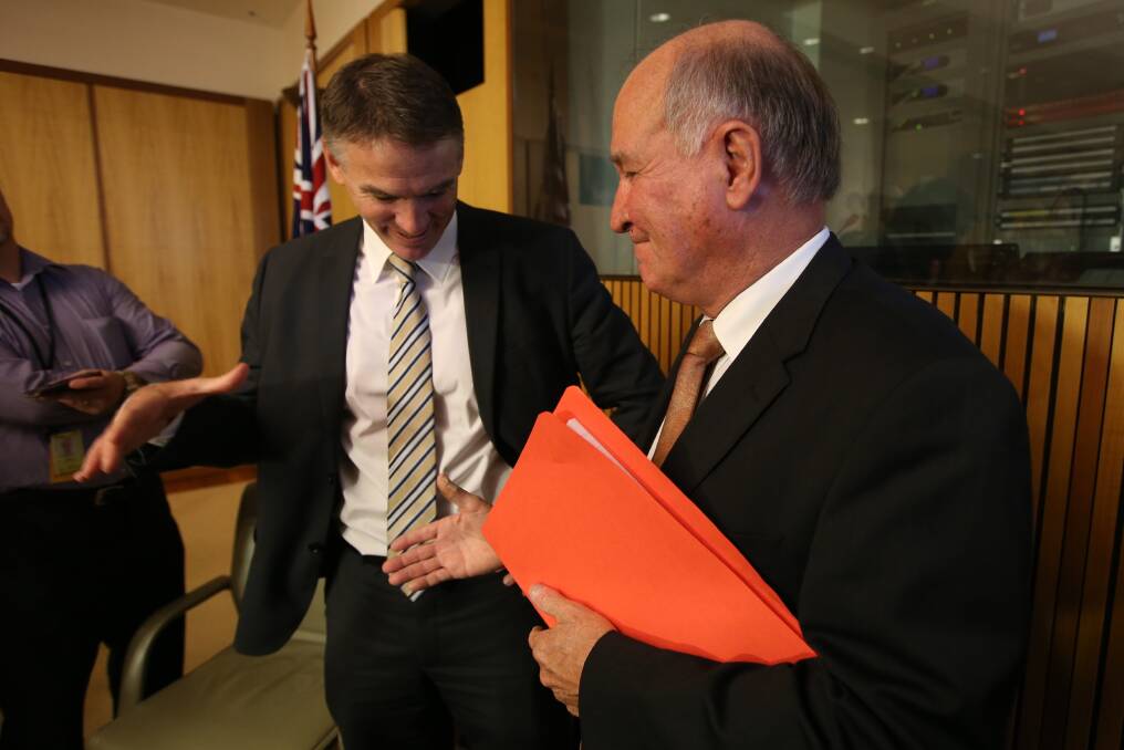 Independent MPs Rob Oakeshott and Tony Windsor bid farewell to politics. Photo: ANDREW MEARES