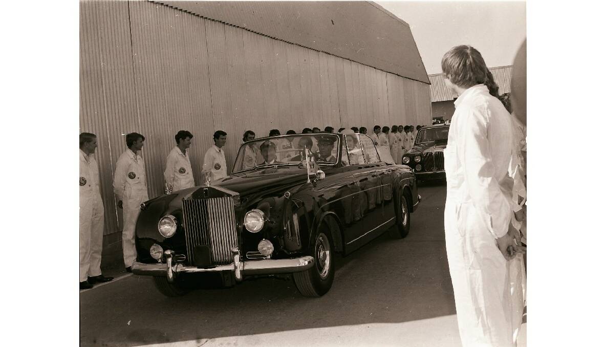 A guard of honour of apprentices welcomes the Queen as she visits the Email factory in 1970.
