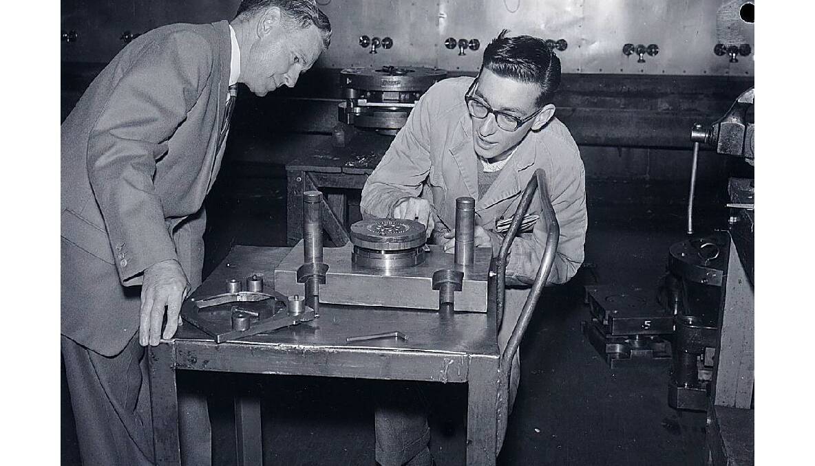 Monty Fabry and son Robert at the Email factory, 1962. Photo: CWD Negative Collection, Orange & District Historical Society.