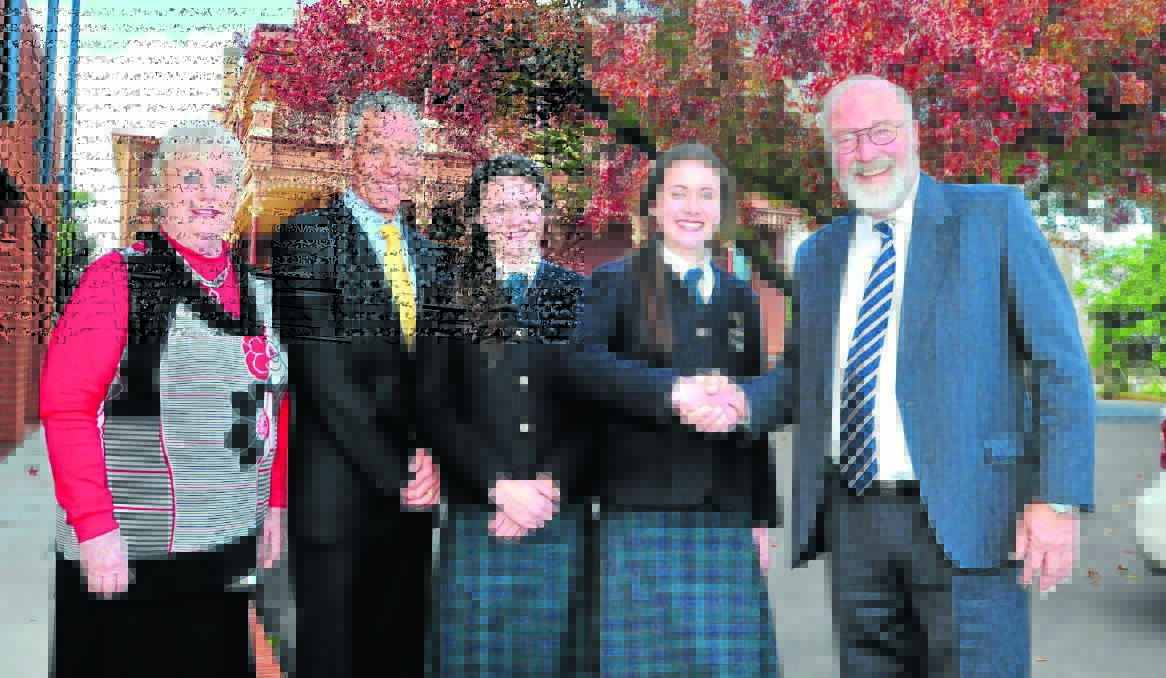 OUT OF THE ASHES: Julie Shinton, Kinross Wolaroi School principal Brian Kennelly, students Talor and Brooke Hamilton and Warrumbungle shire mayor Peter Shinton. Photo: JUDE KEOGH 