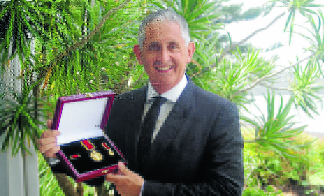 HONOUR: Retired Orange City Council director of enterprise services Stephen Sykes with his Logohu Medal. 