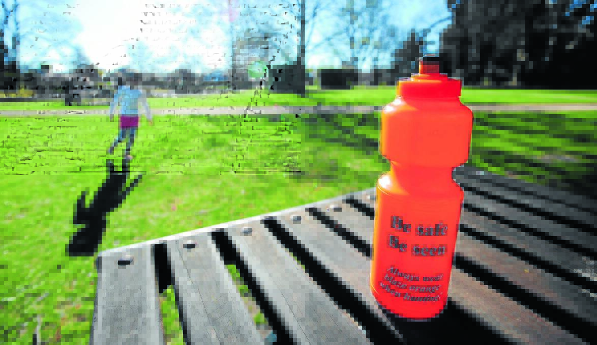 CONTENTIOUS MESSAGE: Primary school children were handed out free water bottles this week from the Game Council telling them to stay safe while hunting. Photo: STEVE GOSCH   0920sggame