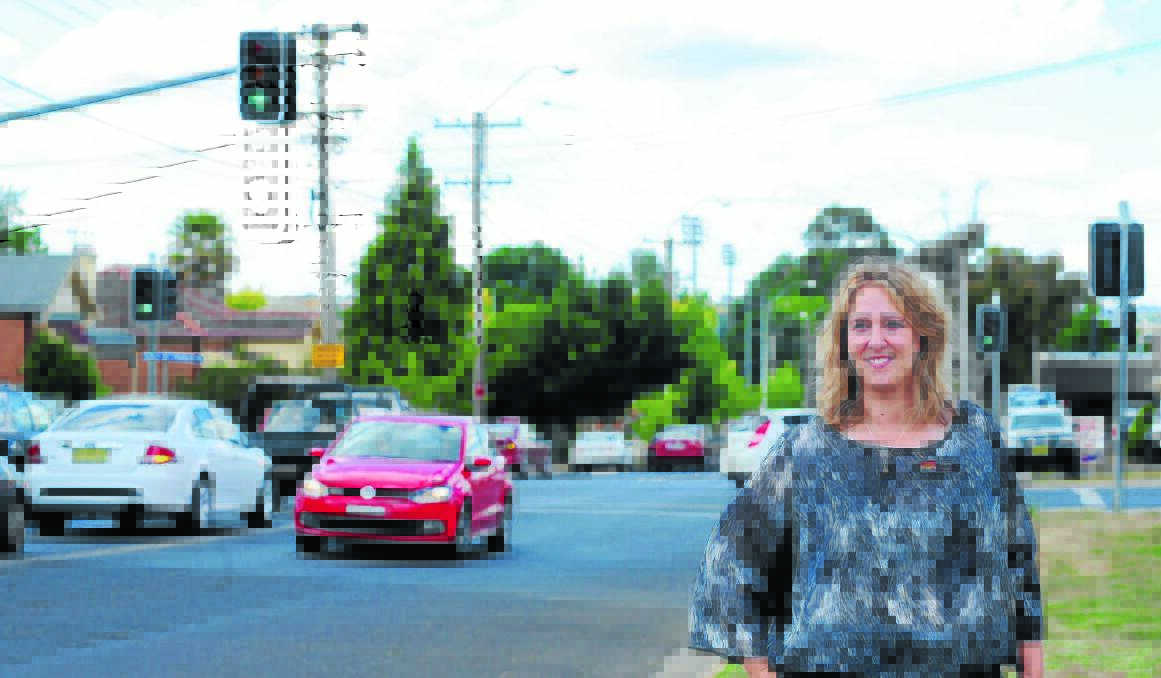 CROSS ROADS: LJ Imaging owner Leiarna Dunworth is unsure whether reopening Franklin Road would fix Peisley Street's traffic woes but suggests removing on-street parking could improve the traffic flow. Photo: STEVE GOSCH 1128sgintersection1