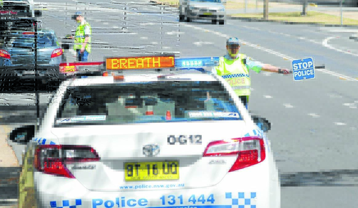 HEEDING THE WARNINGS: Orange drivers have turned in an excellent report card so far, with only one driver caught with a low-range blood alcohol reading while behind the wheel. Photo: STEVE GOSCH 1226sgpolice