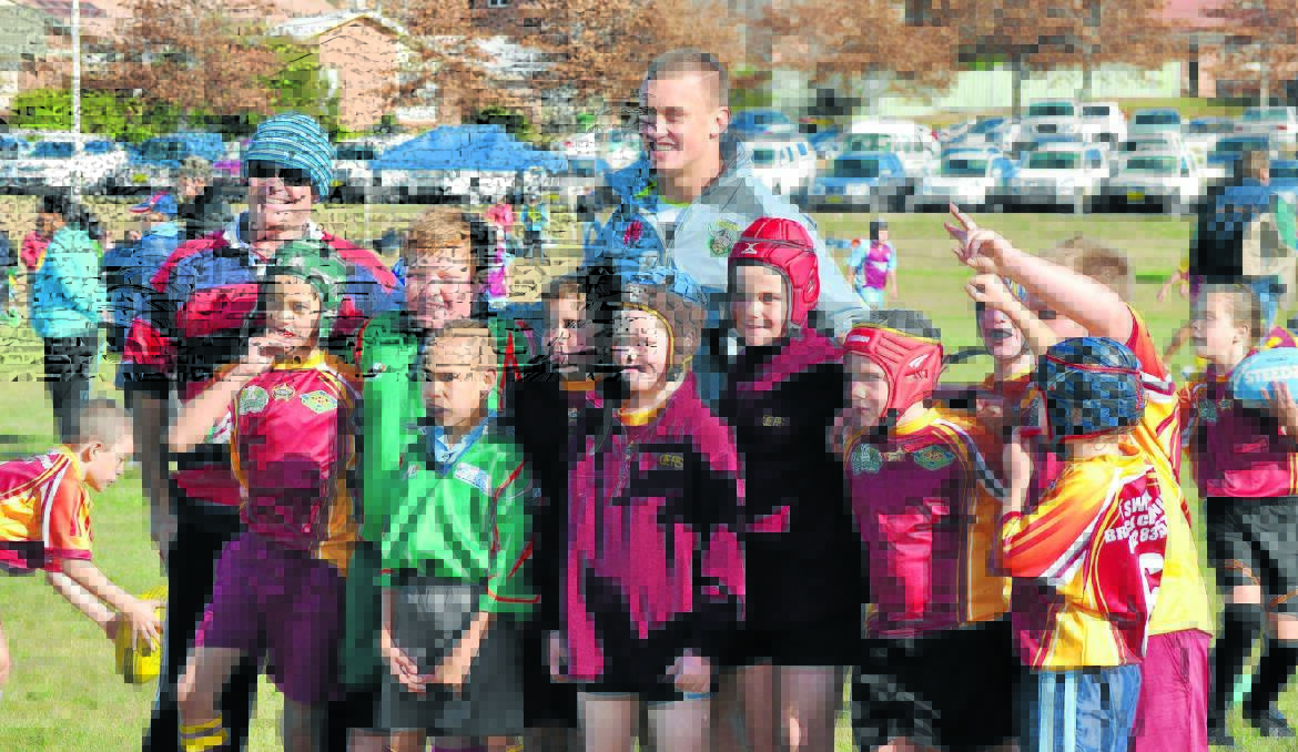KING OF THE KIDS: Canberra Raiders star Jack Wighton at the Peachey Shield at Brendon Sturgeon Oval yesterday. 		               Photo: NICK McGRATH 0528nmjack3